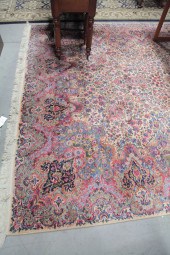 KARASTAN ROOMSIZE RUG.  Americ