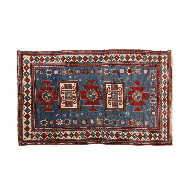 KAZAK AREA RUG Blue field with