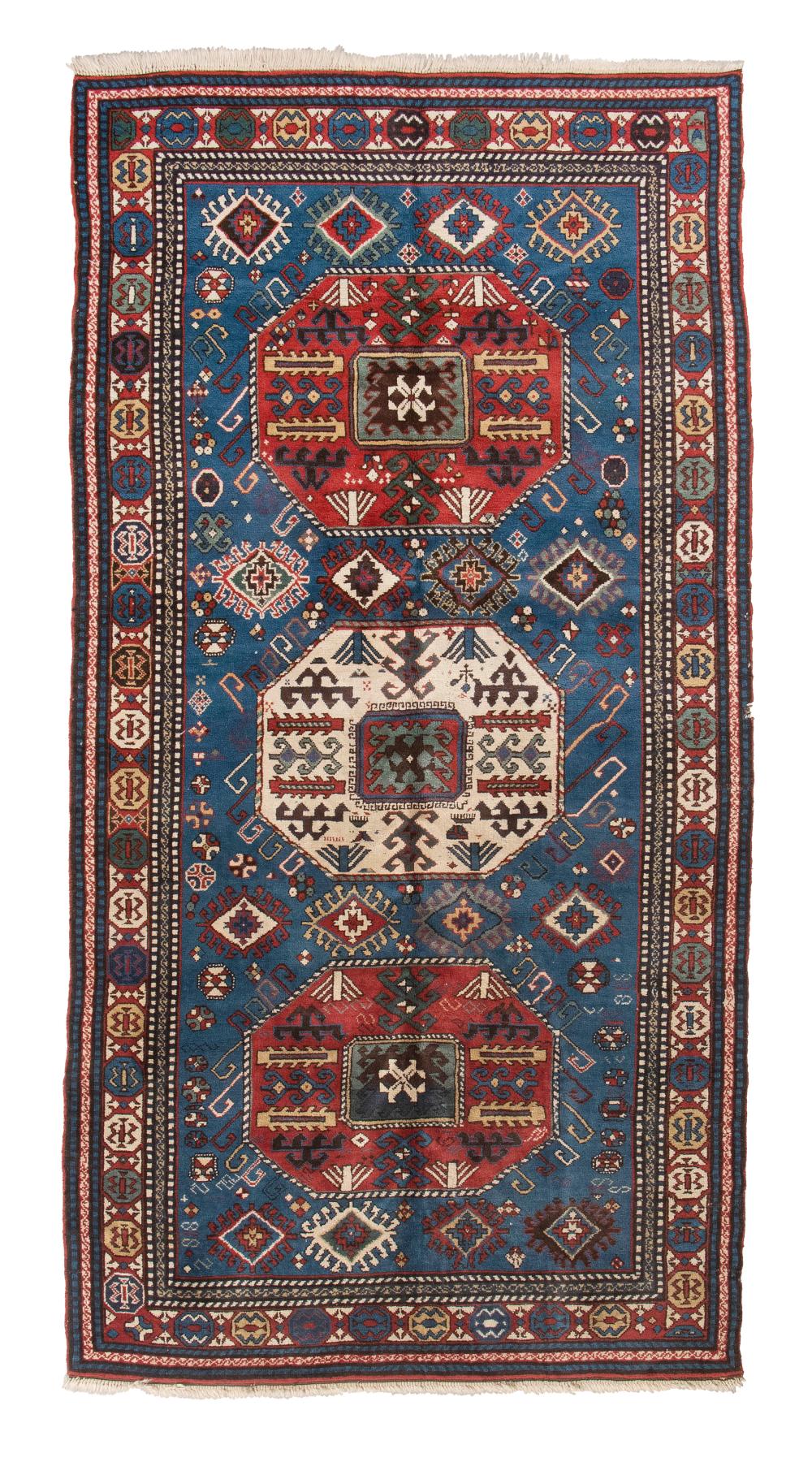 KAZAK DESIGN RUG: 4’10” X 9’7” LAST