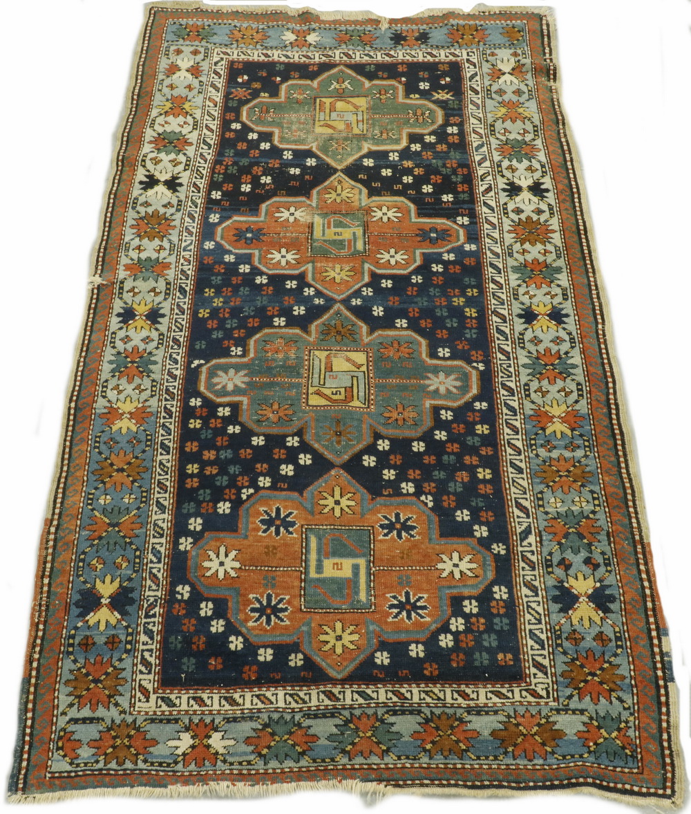 KAZAK RUG Column of four