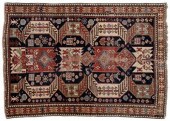 Kazak rug, geometric and wing