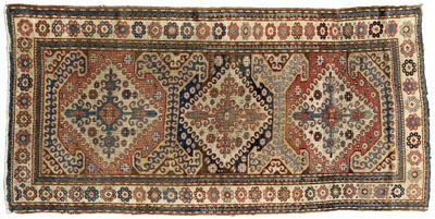 Kazak rug, three central diamonds