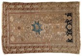 Kazak rug, three central medal