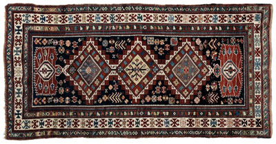 Kazak rug, three large serrated