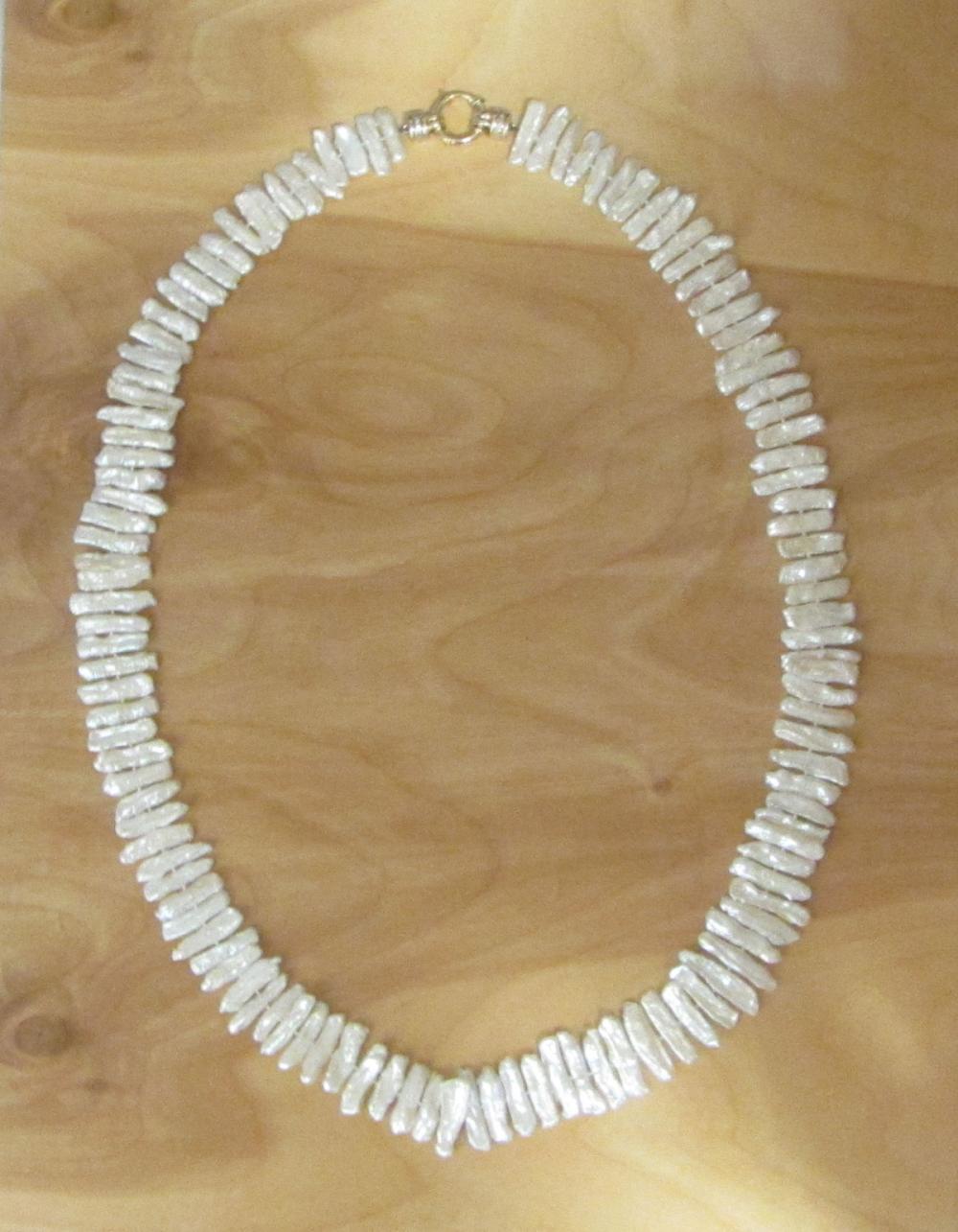 KESHI PEARL AND FOURTEEN KARAT GOLD