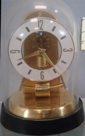 Kundo electromechanical clock,
