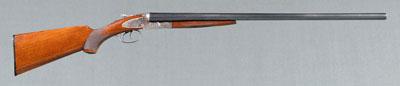 L. C. Smith 12 gauge shotgun,
