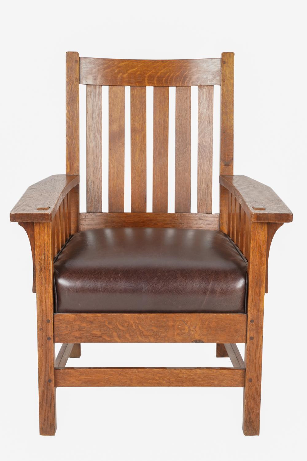 L.& J.G. STICKLEY: OAK ARMCHAIRwith