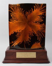 LACQUERED VASE ON WOODEN BASE