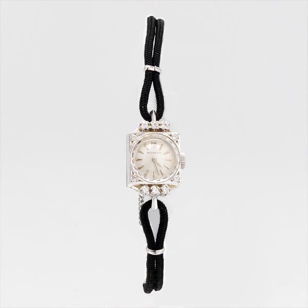 LADIES' 14K AND DIAMOND MOVADO