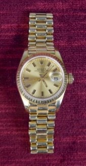 LADIES 18K GOLD ROLEX WATCHLad
