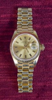 LADIES 18K GOLD ROLEX WATCHLad