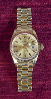 LADIES 18K GOLD ROLEX WATCHLad