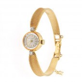 LADIES' 18K L.U. CHOPARD SWISS