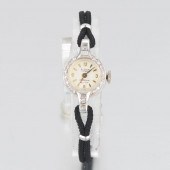 LADIES' ART DECO GOLD AND DIAM