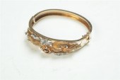 LADIES' BANGLE BRACELET.  Twen
