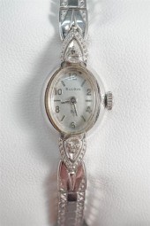 LADIES' BULOVA 14-KARAT WHITE-