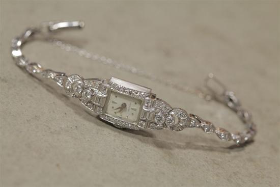 LADIES DIAMOND WRIST WATCH.
