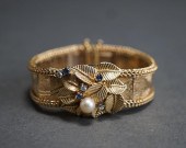 LADIES' ELOGA 14-KARAT YELLOW-