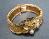 LADIES' ELOGA 14-KARAT YELLOW-