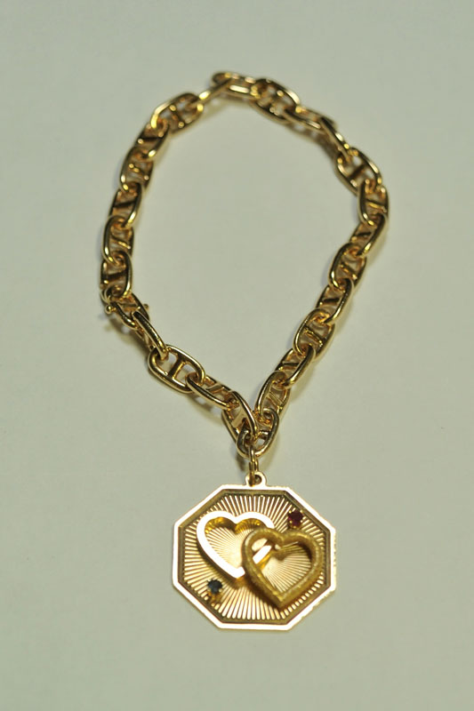 LADIES GOLD CHARM BRACELET. 14K