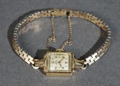 LADIES' OMEGA 14-KARAT YELLOW-