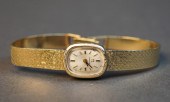 LADIES OMEGA 14-KARAT YELLOW-G