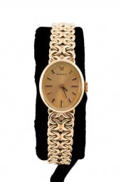 LADIES ROLEX 14K YELLOW GOLD W