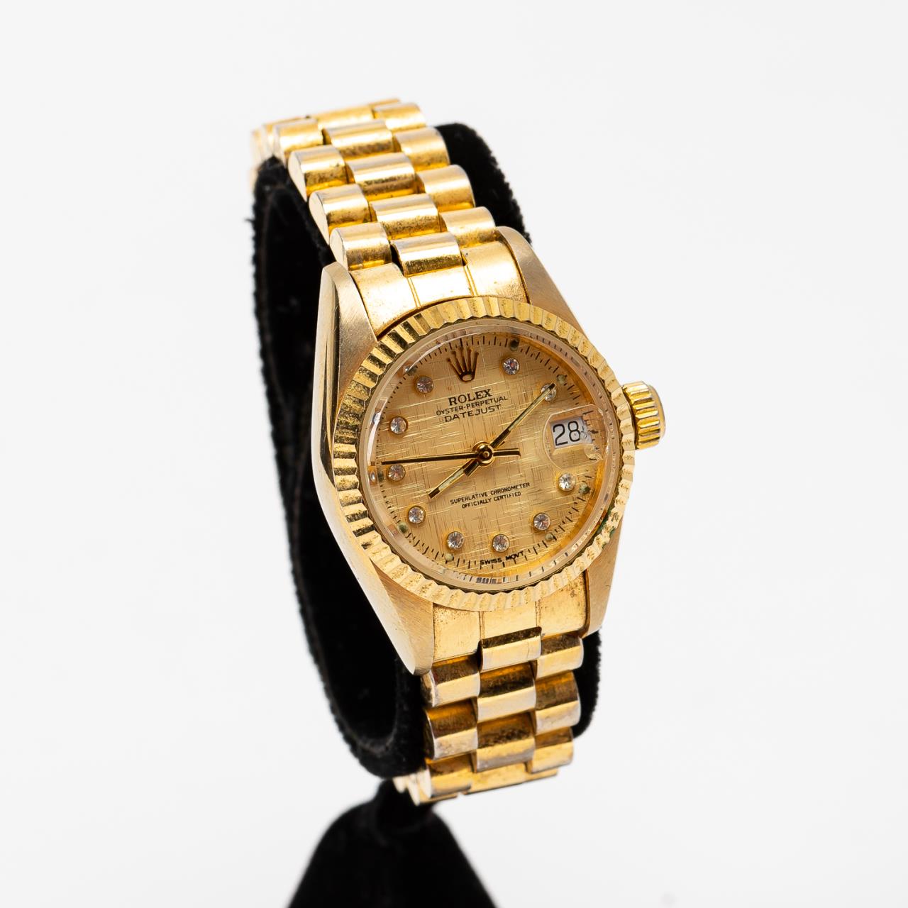 LADIES' ROLEX GOLD DATEJUST WITH