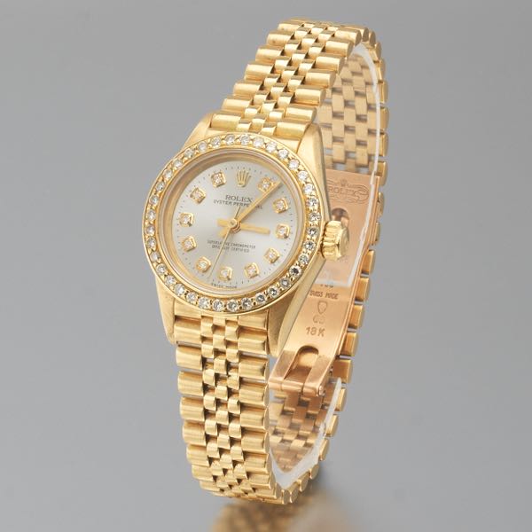 LADIES' ROLEX OYSTER PERPETUAL