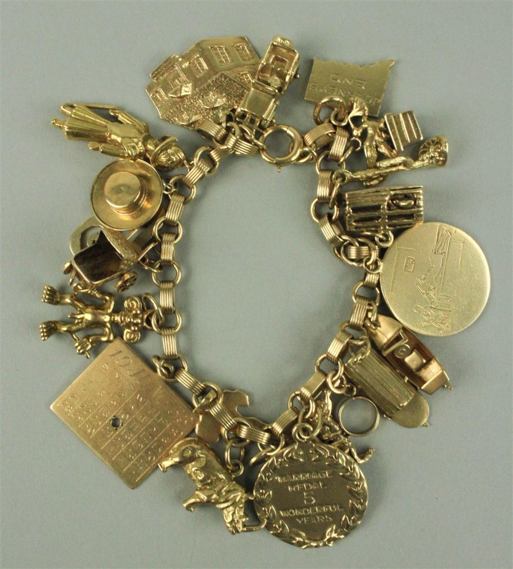 LADY'S 14K LARGE CHARM BRACELET the