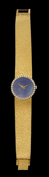 Lady's 18 karat yellow gold di
