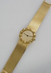LADY'S 18-KARAT YELLOW-GOLD QU