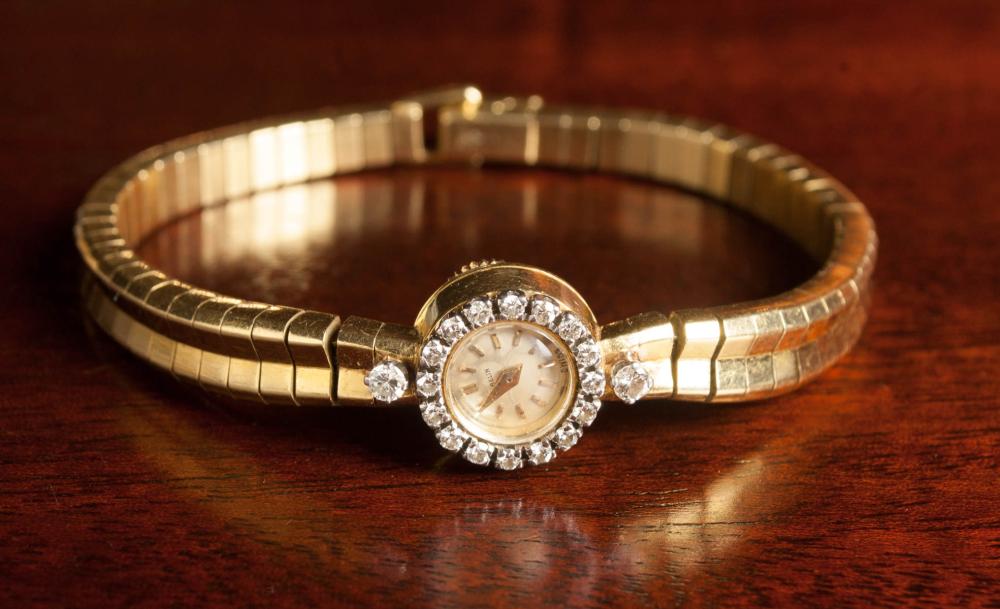 LADY'S DIAMOND AND EIGHTEEN KARAT
