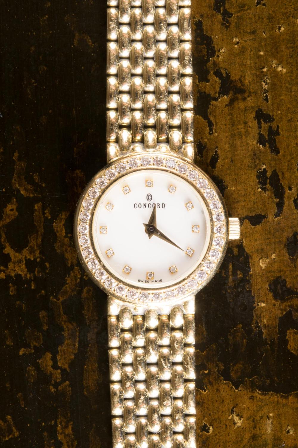 LADY'S DIAMOND AND EIGHTEEN KARAT