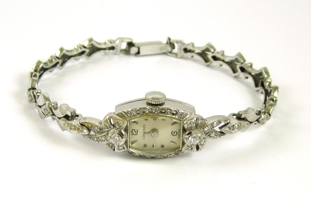LADY'S DIAMOND AND FOURTEEN KARAT