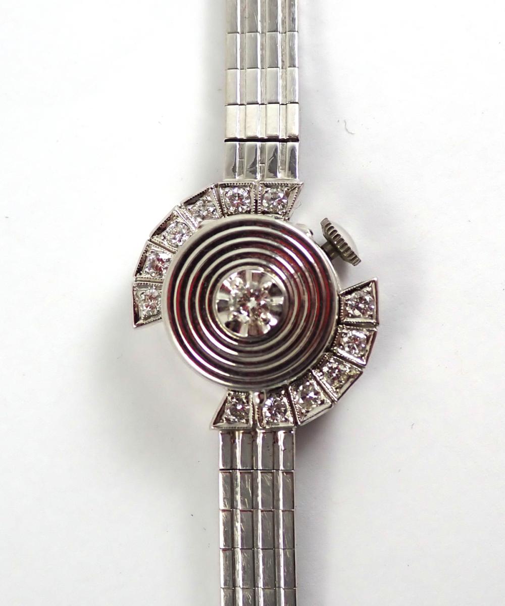 LADY'S DIAMOND AND FOURTEEN KARAT