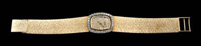Lady's diamond and gold wristwatch,