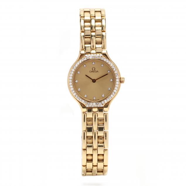 LADY'S GOLD AND DIAMOND WATCH,