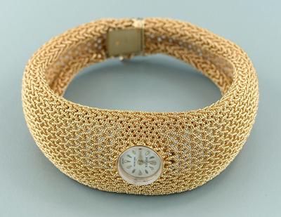 Lady's gold Rolex wristwatch, face,