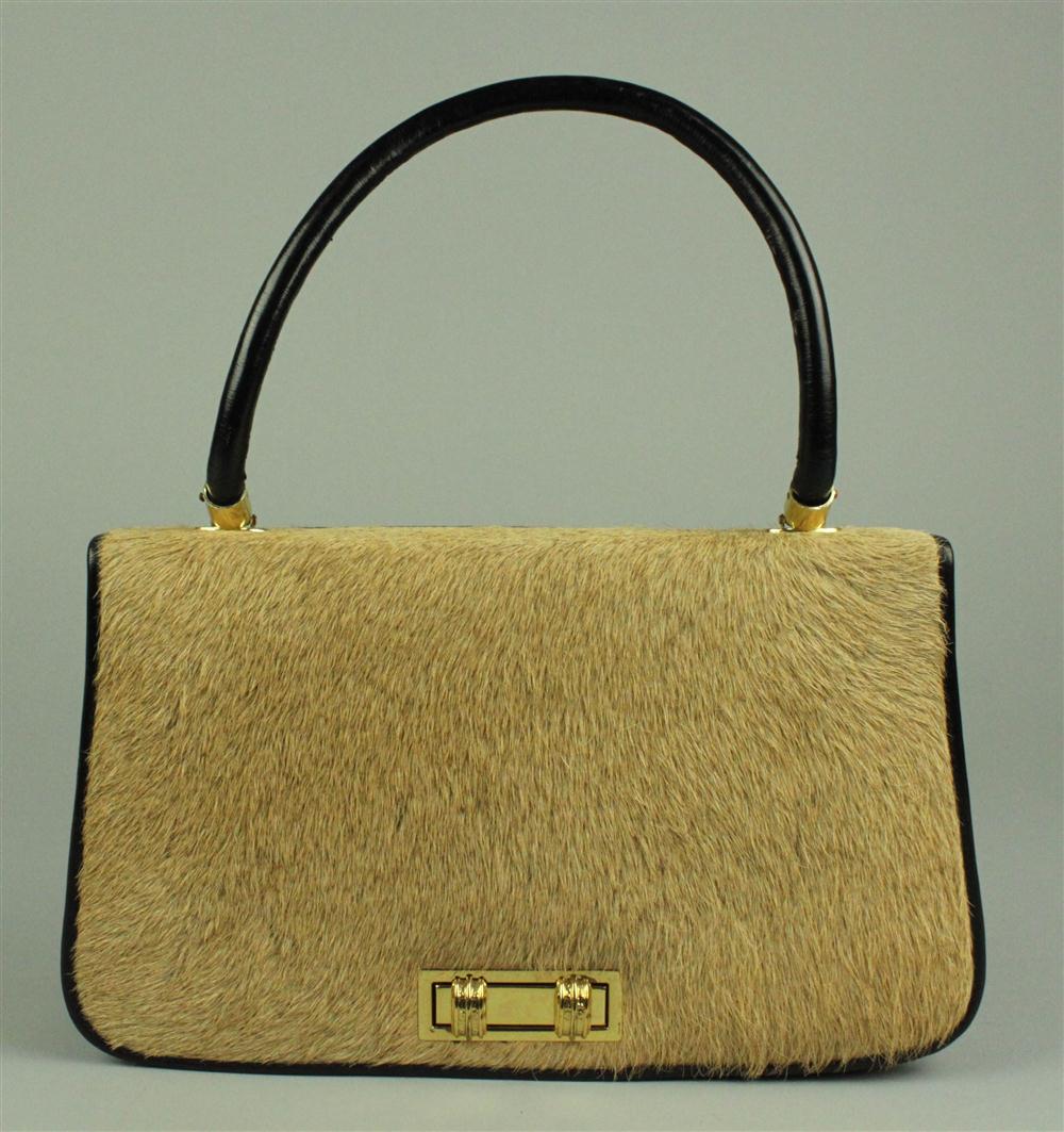 LADY'S LION SKIN AND LEATHER
