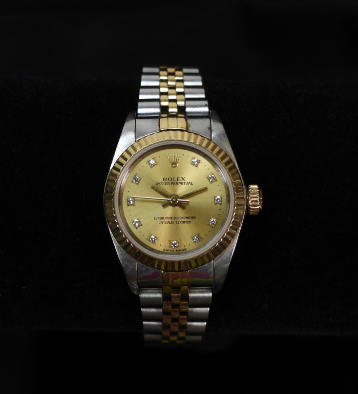 LADY'S ROLEX 18K GOLD & STAINLESS