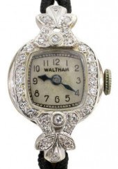 LADY'S WALTHAM 14KT GOLD 0.31C