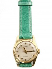 LADY'S WRISTWATCH - 14K yellow