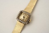 LADY'S WRISTWATCH - A 14K yell