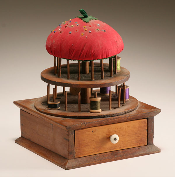 Large antique sewing companion with