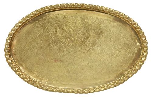 LARGE ARABESQUE REPOUSSE BRASS OVAL