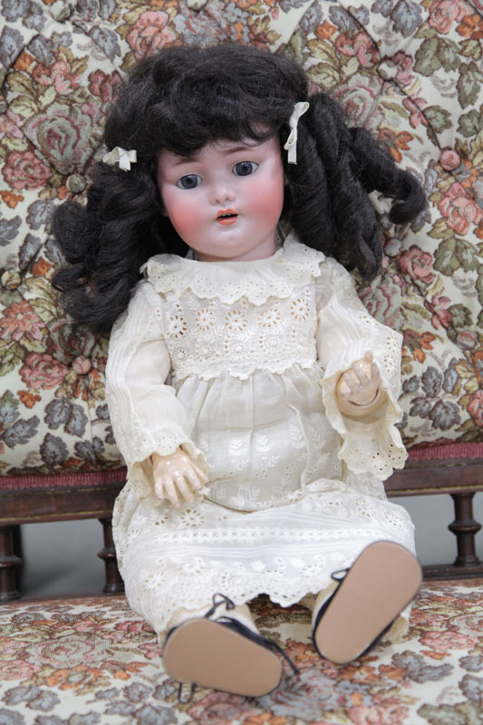 LARGE BISQUE HEAD DOLL. Simon &