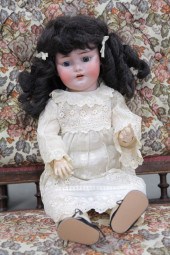 LARGE BISQUE HEAD DOLL. Simon