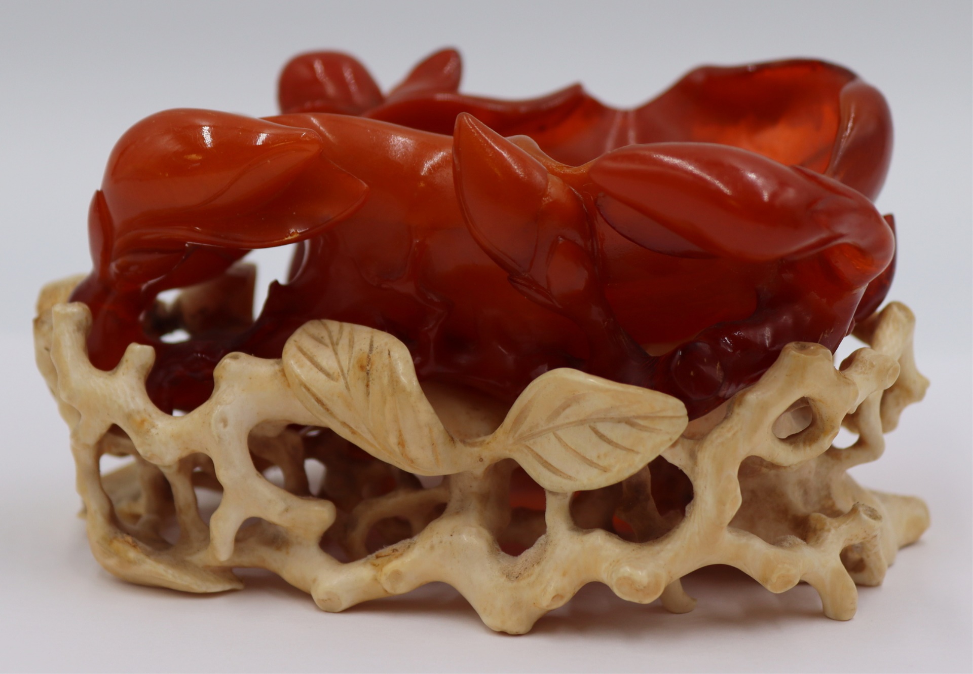 LARGE CARVED AMBER WATER COUPE.